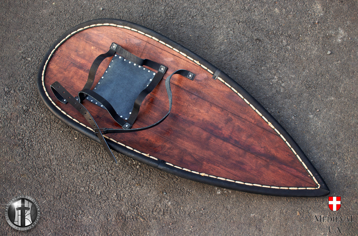 Big dark blue kite medieval shield with a dark red Dragon pattern