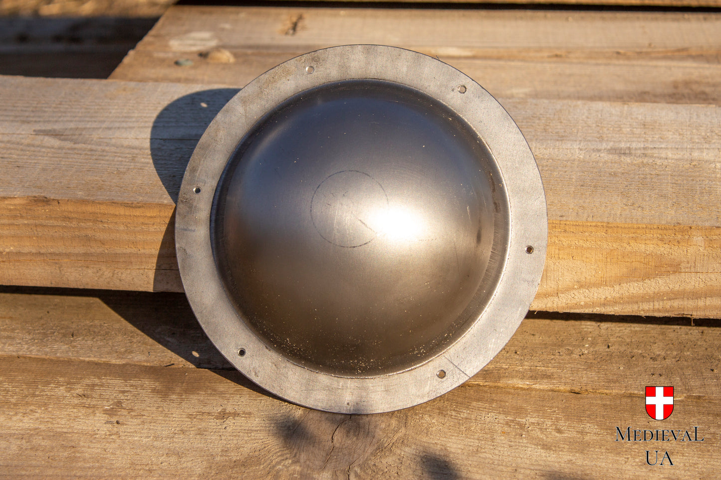 Steel shield boss