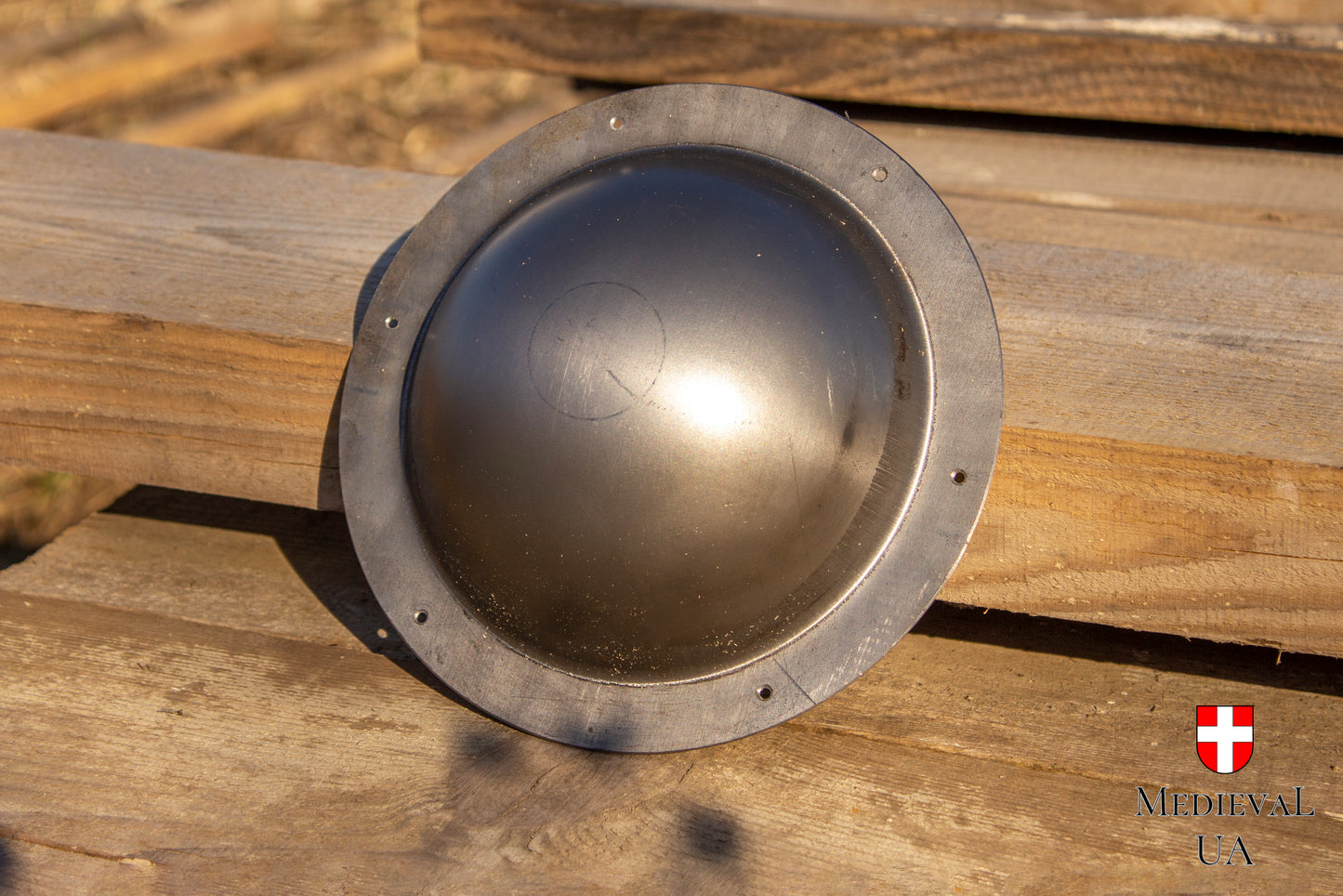 Steel shield boss