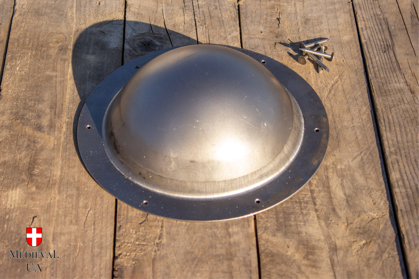 Steel shield boss