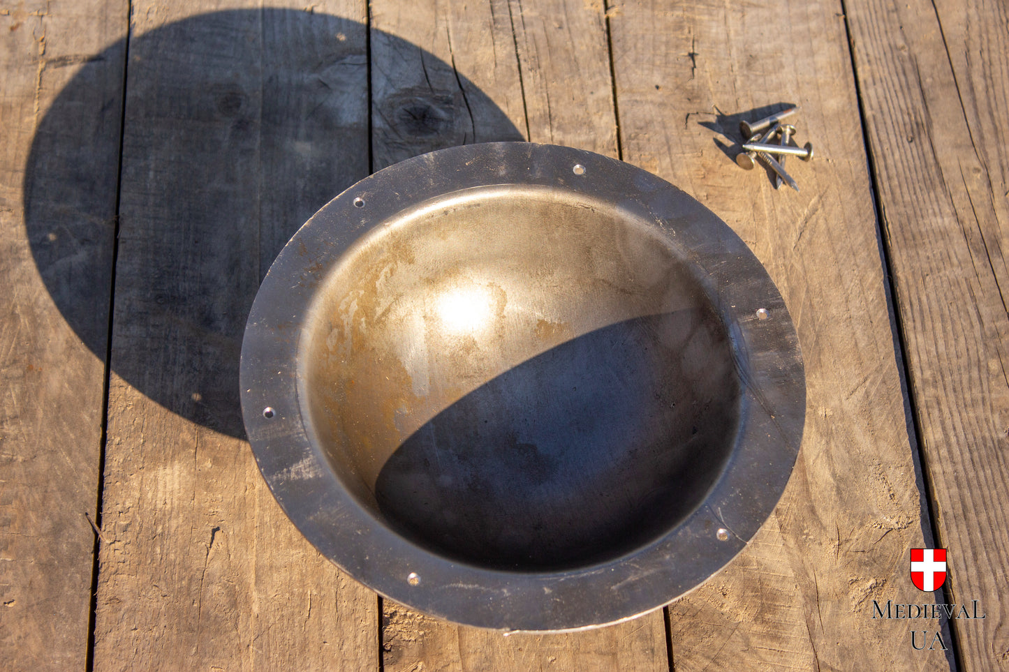 Steel shield boss