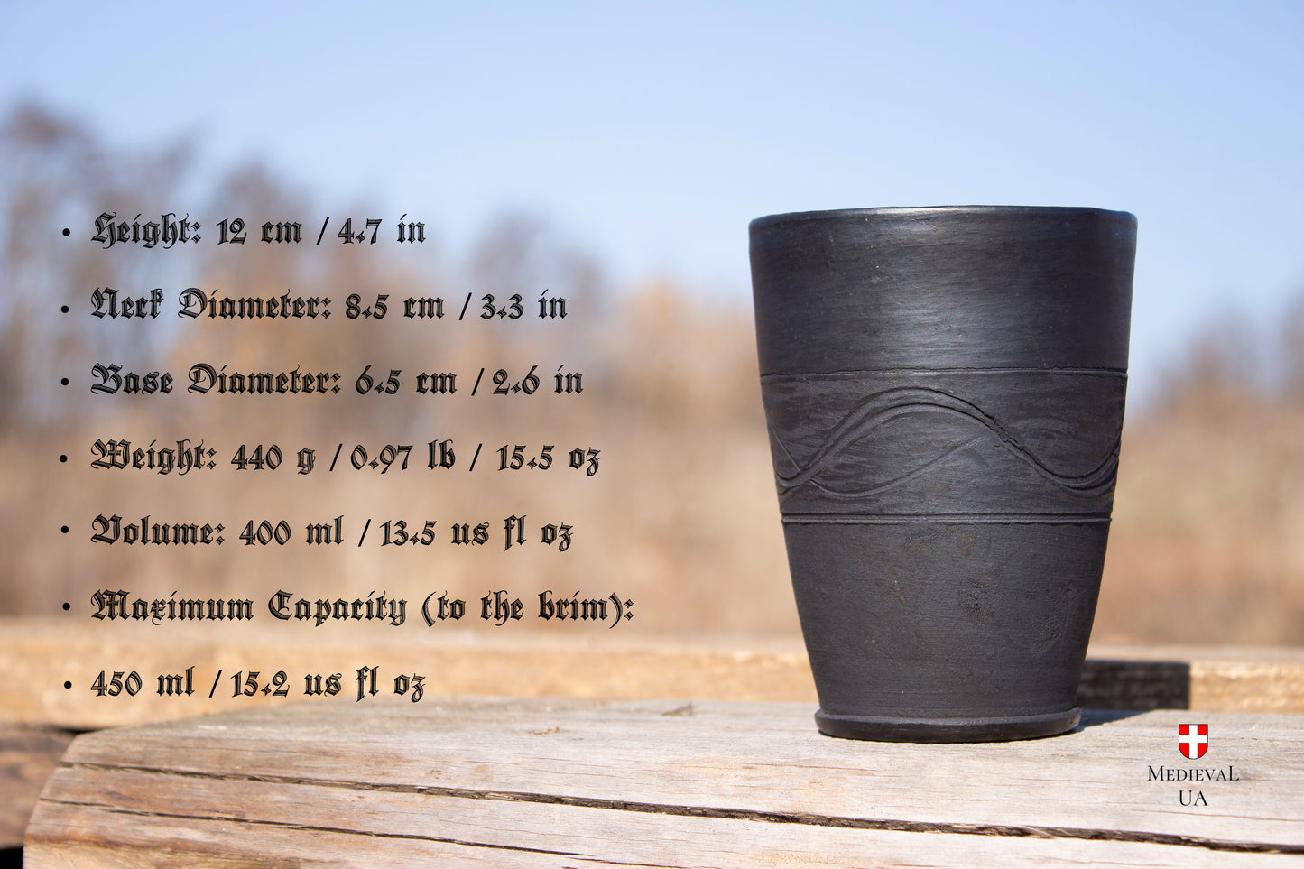 a matte black medieval clay chalice size