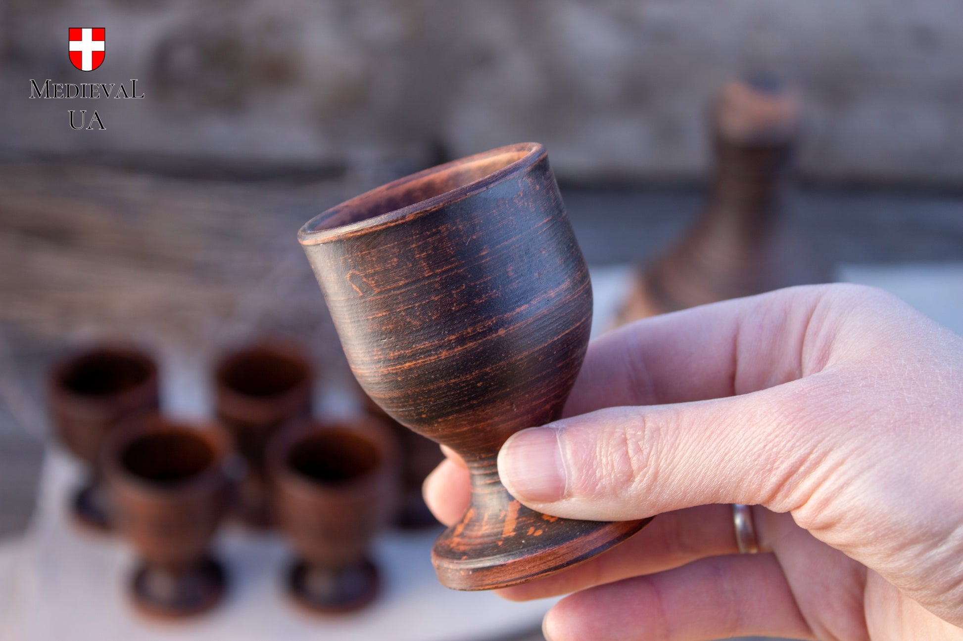 Turned stem and foot of a handmade ceramic cordial cup