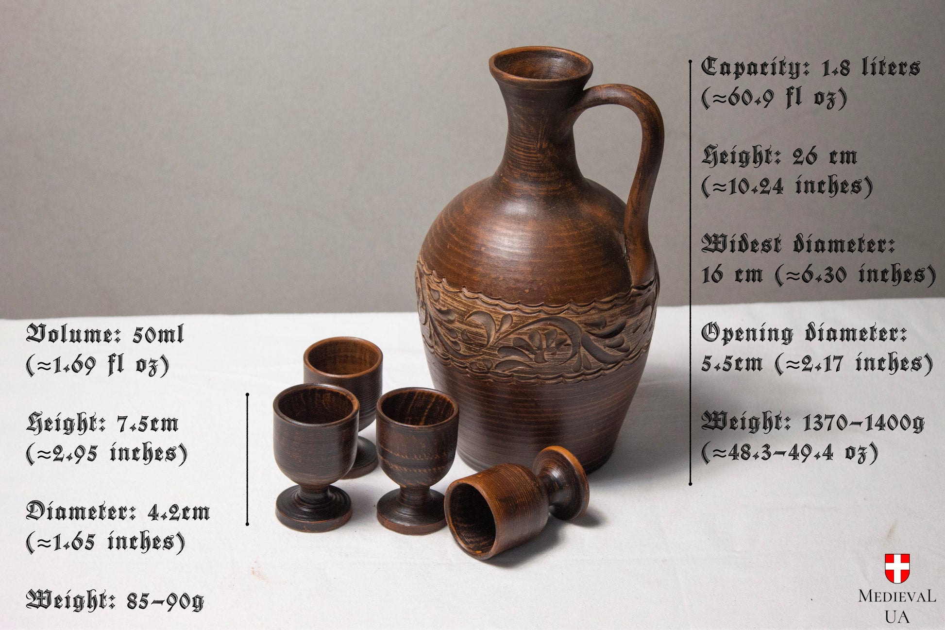 Wine jug set size guide: 1.8 litre carved jug and 50 ml cups