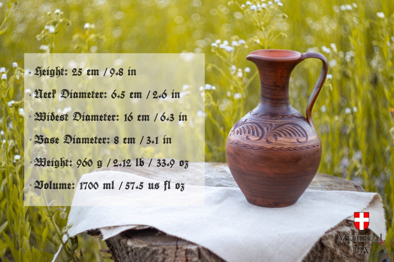 Carved red clay pitcher with size details: 25 cm tall, holds 1700 ml