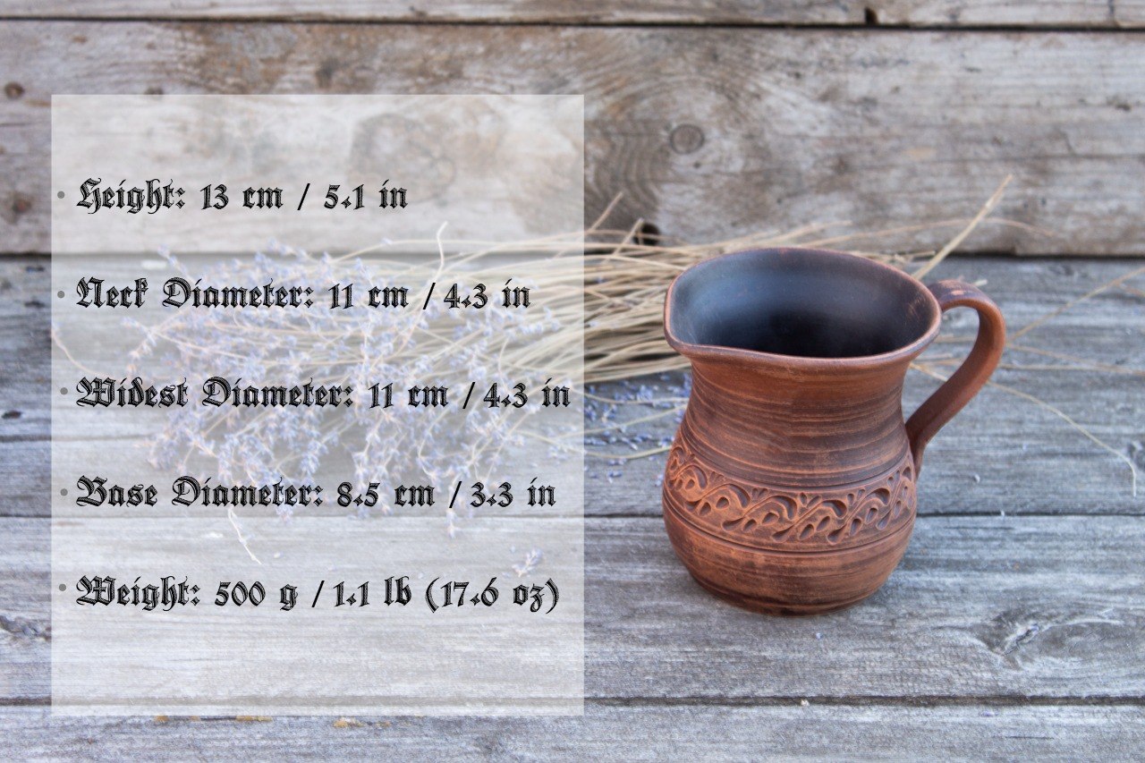 Small handmade clay pitcher with volume and capacity details